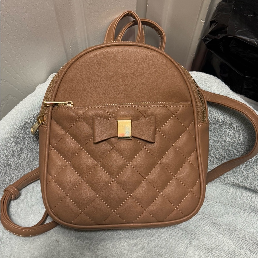 Brown Quilted Backpack with Bow Accent